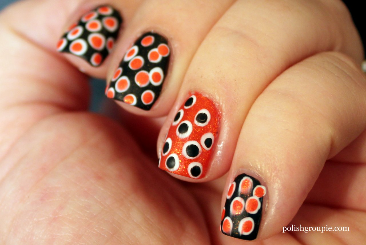 Orange And Black Polka Dots Nail Art