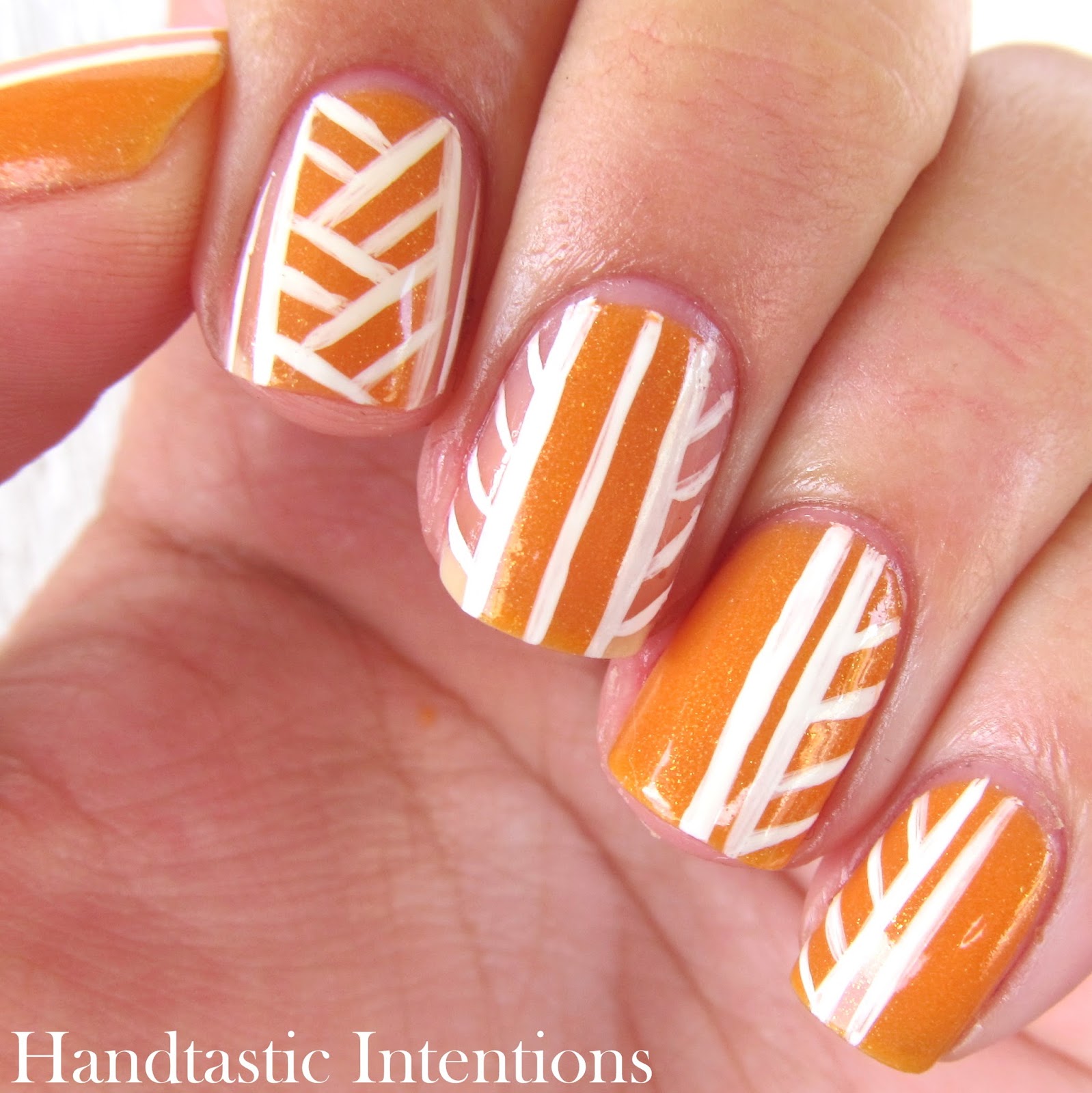 Orange And White Lines Design Nail Art