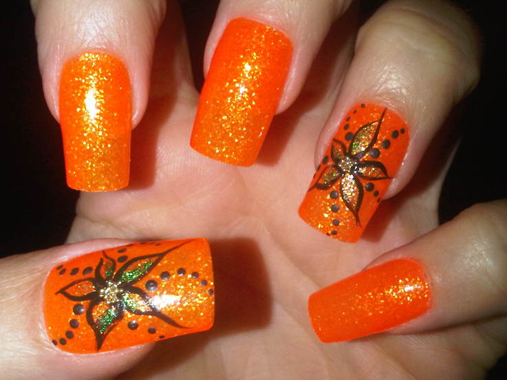 Orange Glitter And Flower Design Nail Art