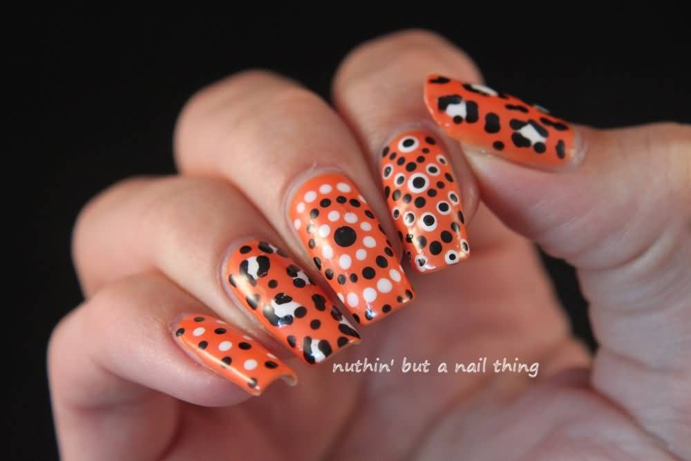 Orange Nails With Black And White Polka Dots Nail Art