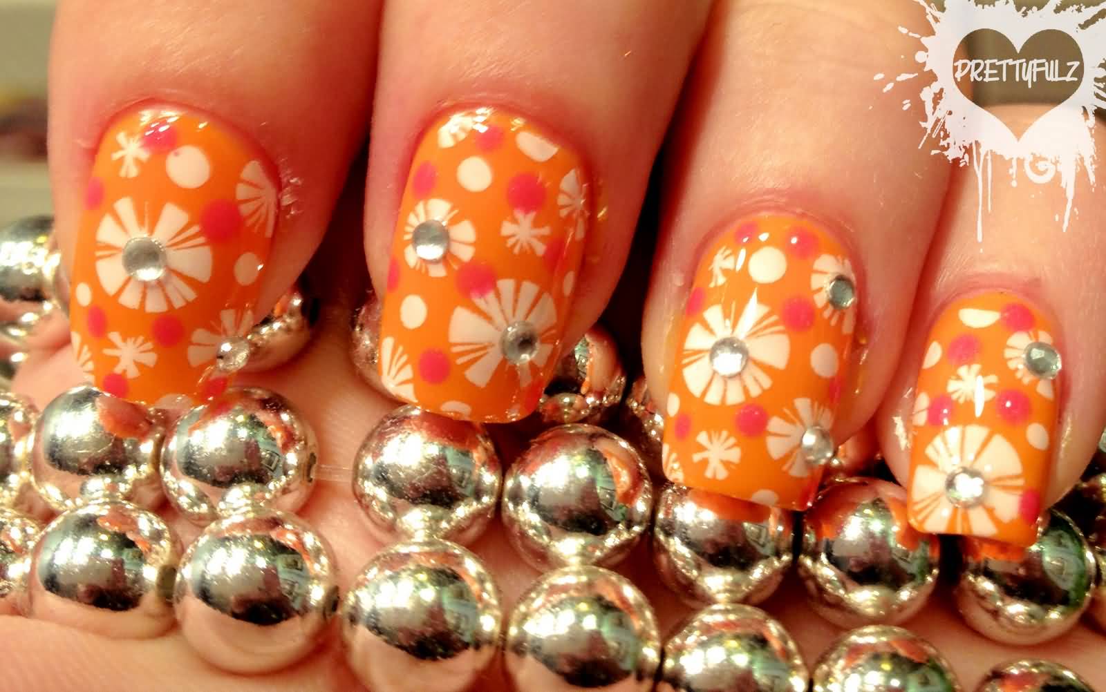 Orange Nails With White Flowers Nail Art