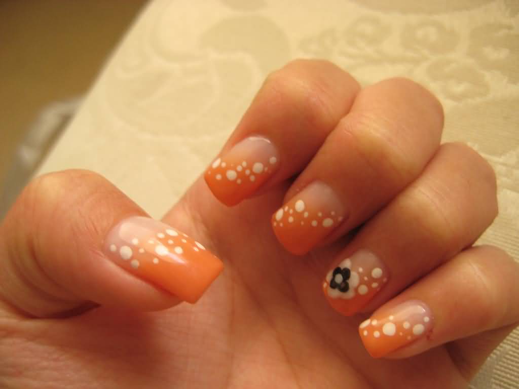 Orange Nails With White Polka Dots And Black Floral Design Nail Art