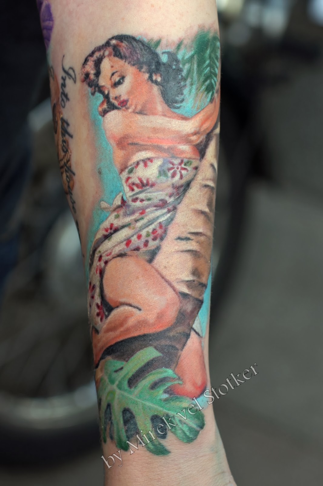 Pin Up Girl Tattoo On Forearm