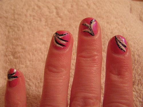 Pink Short Nails With Black And White Floral Design