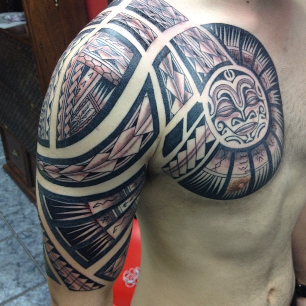 Polynesian Western Tattoo On Right Chest To Half Sleeve For Men