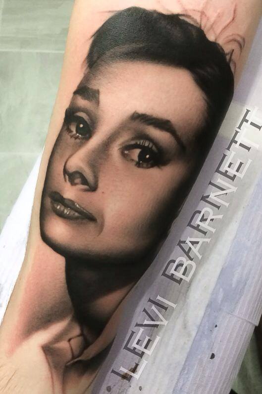 Portrait tattoo on arm by Levi Barnett 1
