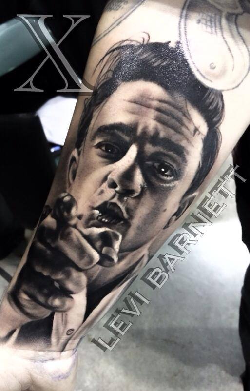 Portrait tattoo on arm by Levi Barnett 2