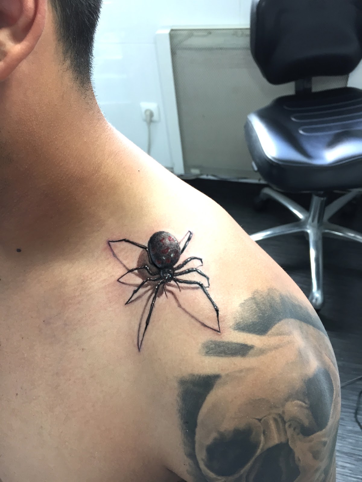 Realistic Black Widow Tattoo On Upper Shoulder