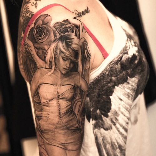 Realistic Pin Up Angel Tattoo On Right Half Sleeve