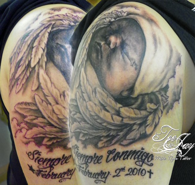 Realistic Remembrance Tattoo On Shoulder For Baby