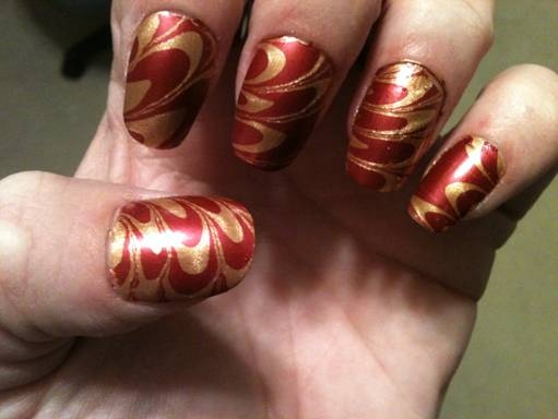 Red And Gold Water Marble Nail Art