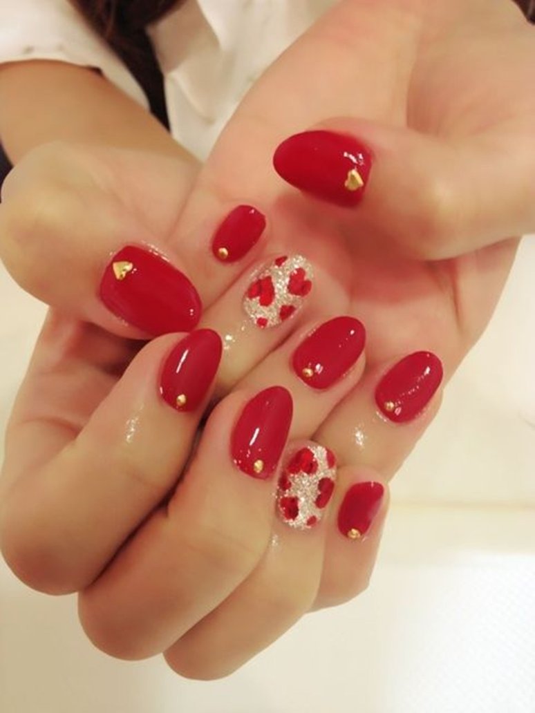 Red And Golden Stud Hearts Nail Art
