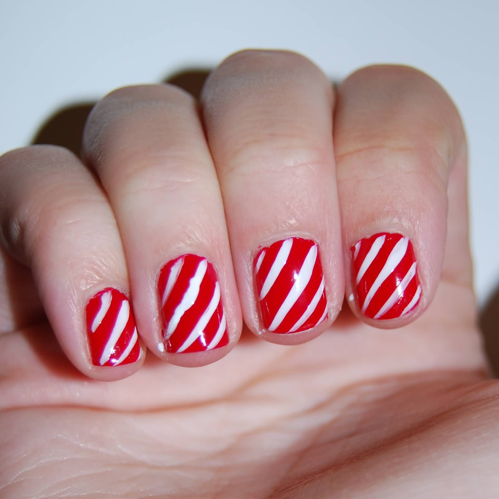 Red And White Stripes Candy Cane Nail Art Design Idea