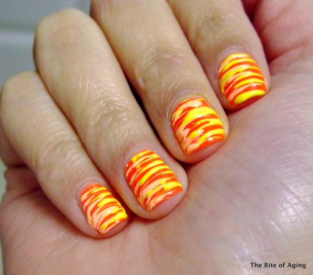 Red And Yellow Water Marble Nail Art