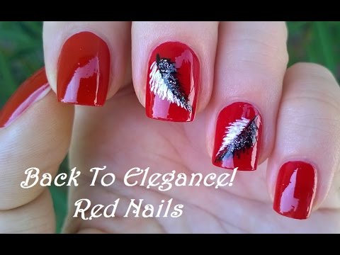 Red Glossy Nails With Black And White Feather Design Idea