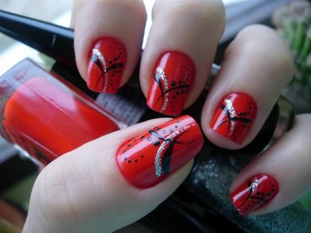 Red Nails With Black And White Design Nail Art