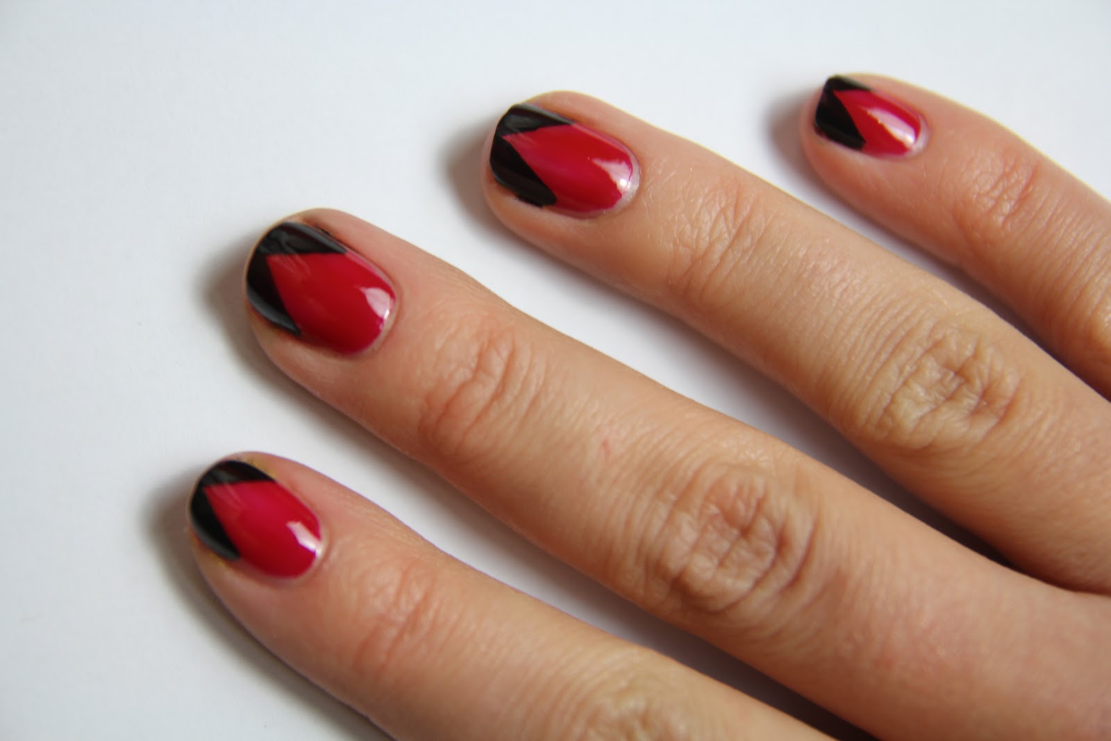 Red Nails With Black Chevron Tip Design Idea