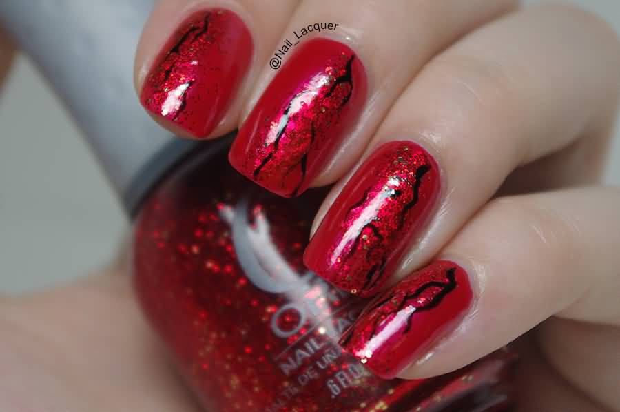 Red Nails With Black Cracked Design Nail Art