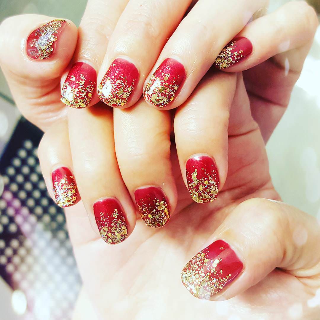 Red Nails With Gold Glitter Nail Art