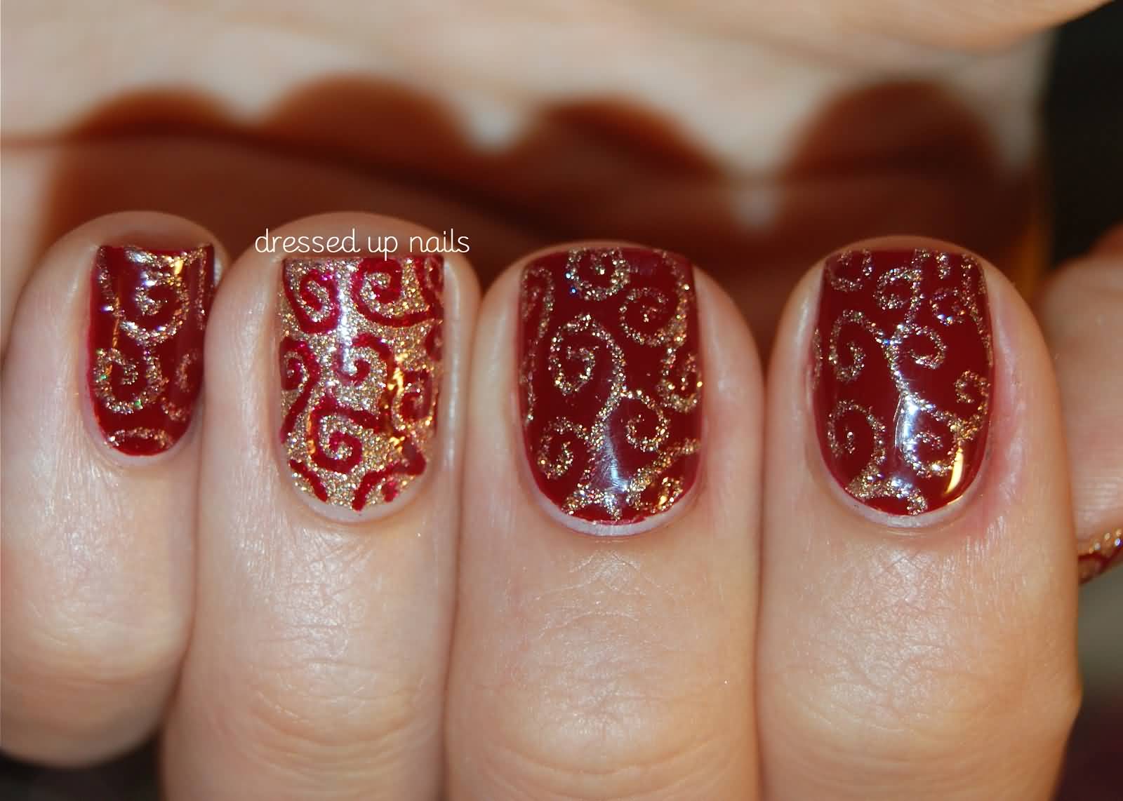Red Nails With Gold Glitter Swirls Design Nail Art