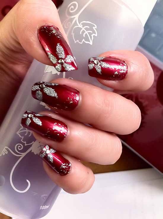 Red Nails With Silver Flowers Nail Art Design
