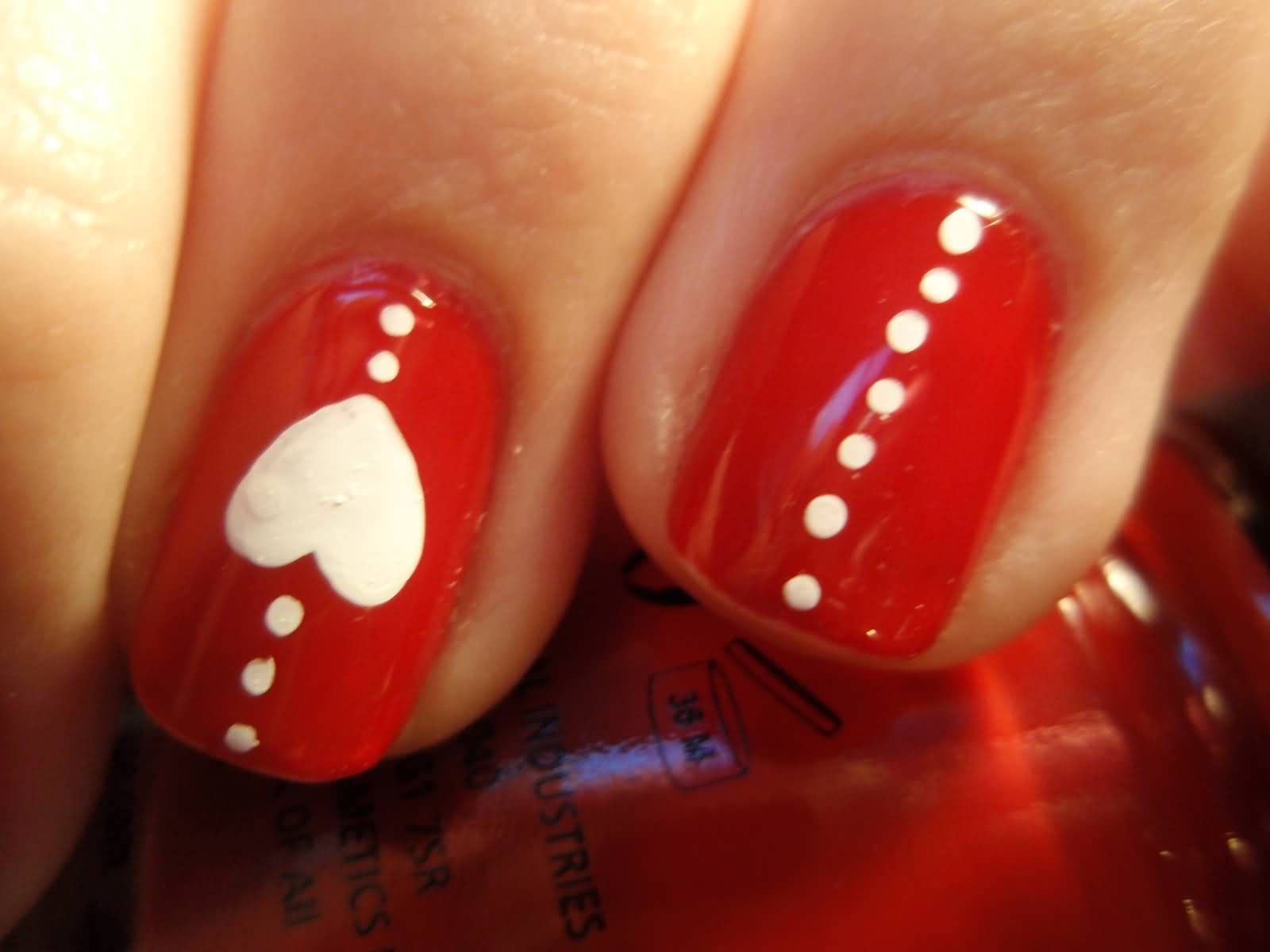Red Nails With White Dots And Heart Design Nail Art