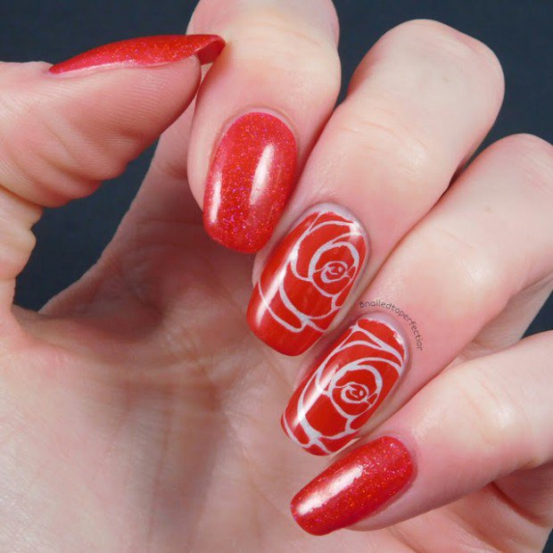 Red Nails With White Floral Design Nail Art