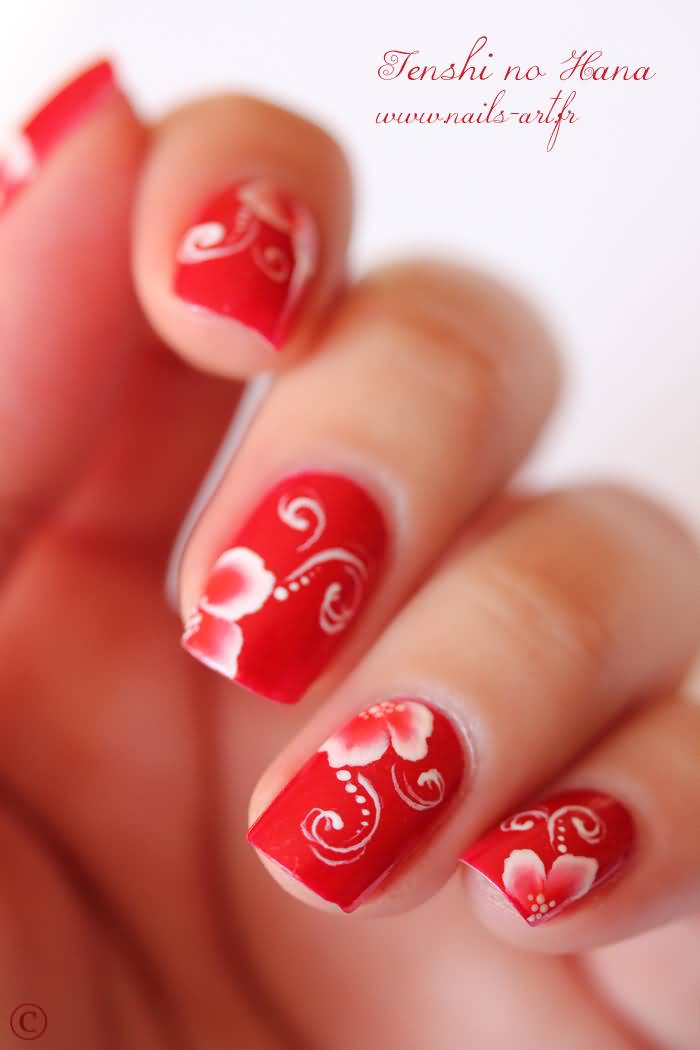 Red Nails With White Flower Design Nail Art