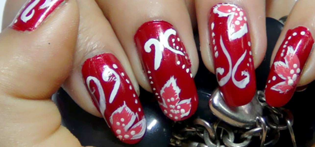 Red Nails With White Flowers Nail Art