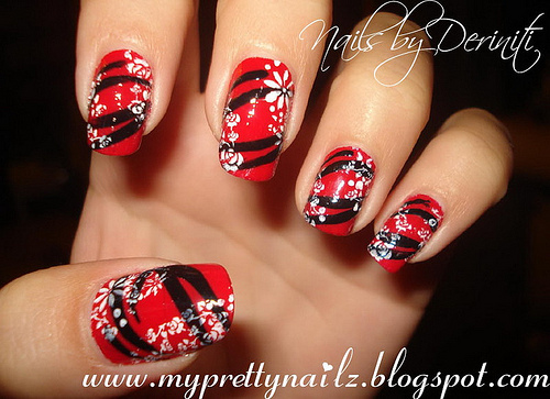 Red Nails With White Flowers Picture