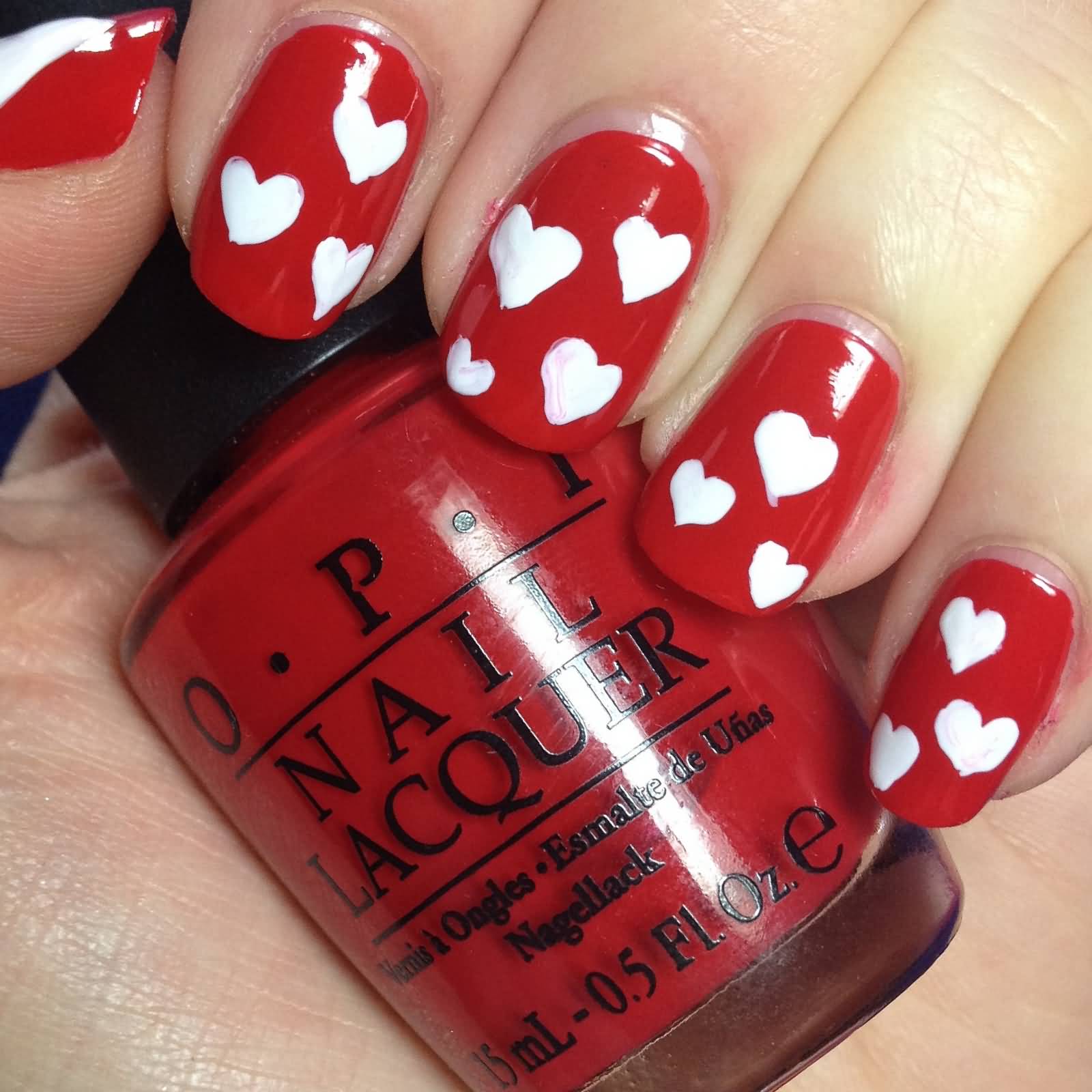 Red Nails With White Hearts Design Idea