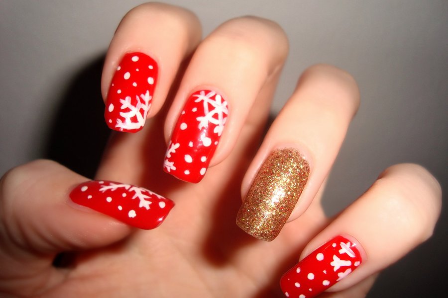 Red Nails With White Snowflakes Christmas Nail Art