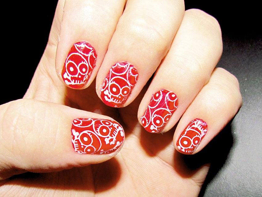 Red Nails With White Skulls Design Nail Art