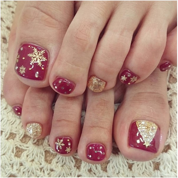 Red Toe Nails With Golden Snowflakes Design Idea