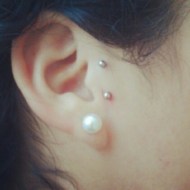 Right Ear Lobe With Pearl Stud And Surface Ear Piercing