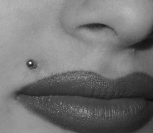 Right Monroe Top Lip Piercing With Silver Stud
