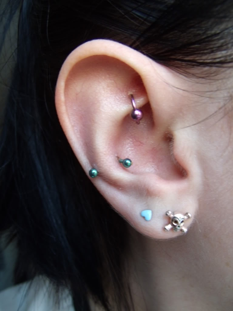 Rook And Snug Piercing With Green Barbell
