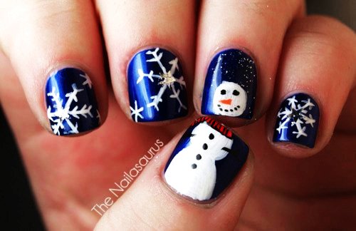 Royal Blue Nails With White Snowflakes And Snowman Design Christmas Nail Art