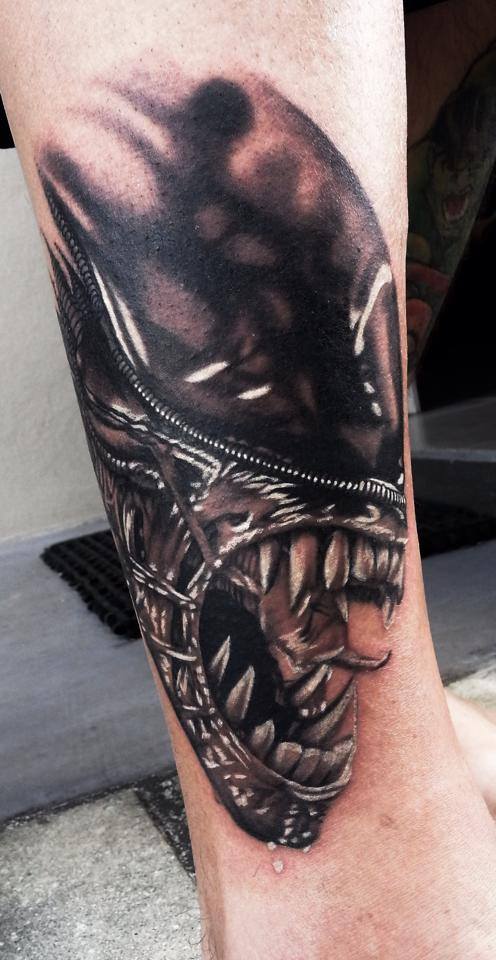 Scary arm tattoo by Levi Barnett