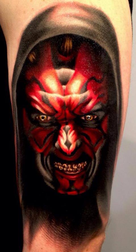 Scary devil tattoo on arm by Levi Barnett
