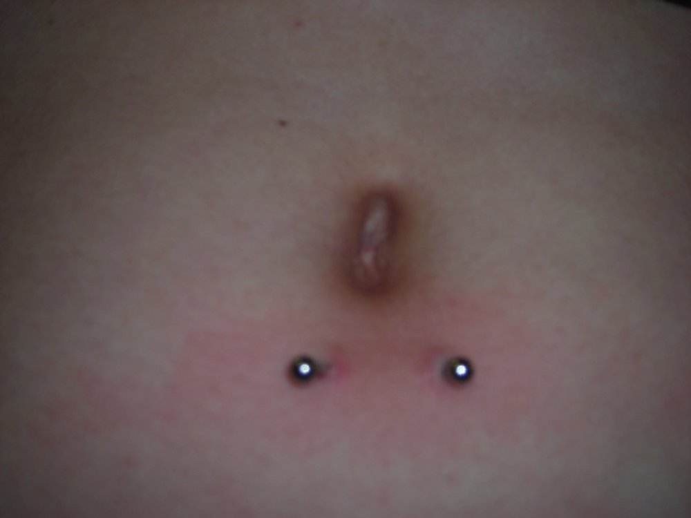 Silver Barbell Surface Navel Piercing