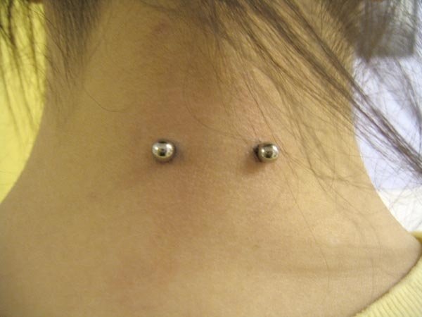 Silver Barbell Surface Neck Piercing Picture For Girls
