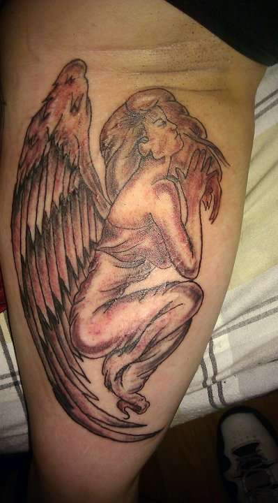 Simple Grey Praying Angel Tattoo On Thigh