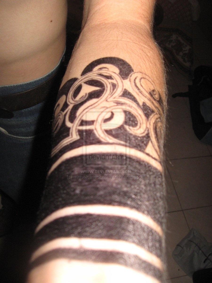 Simple Tribal Spiral Tattoo On Arm By Miguelcasatrochemy