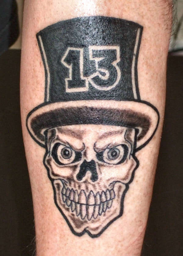 Skull With 13 Number On Hat Tattoo