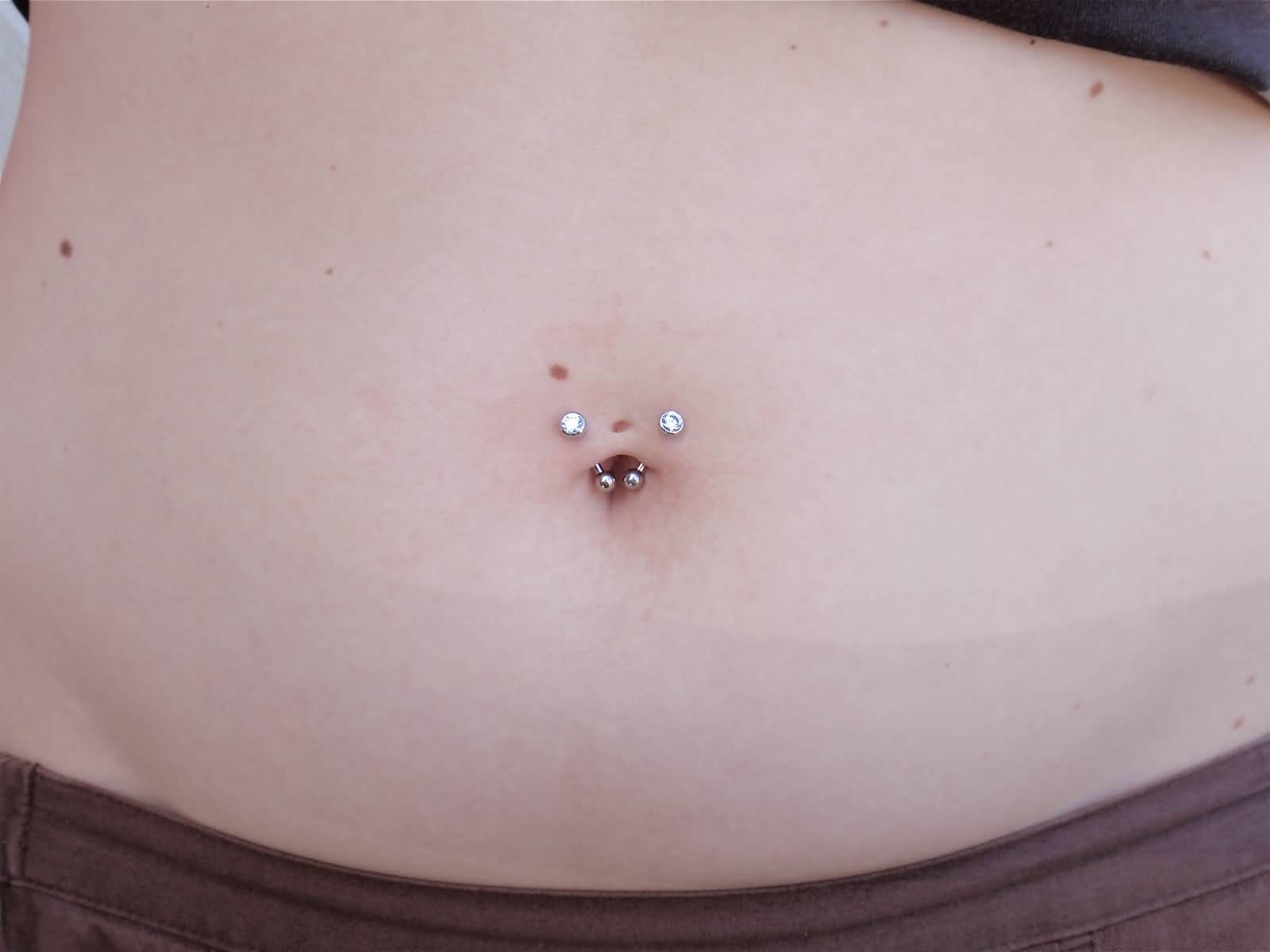 Small Barbells Surface Navel Piercing