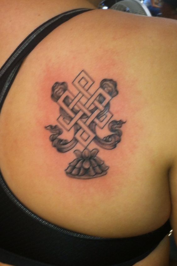 Small Buddhist Endless Knot Tattoo For Girls
