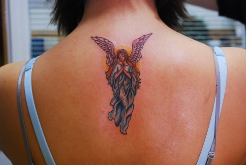 Small Flying Praying Angel Tattoo On Upper Back For Girls