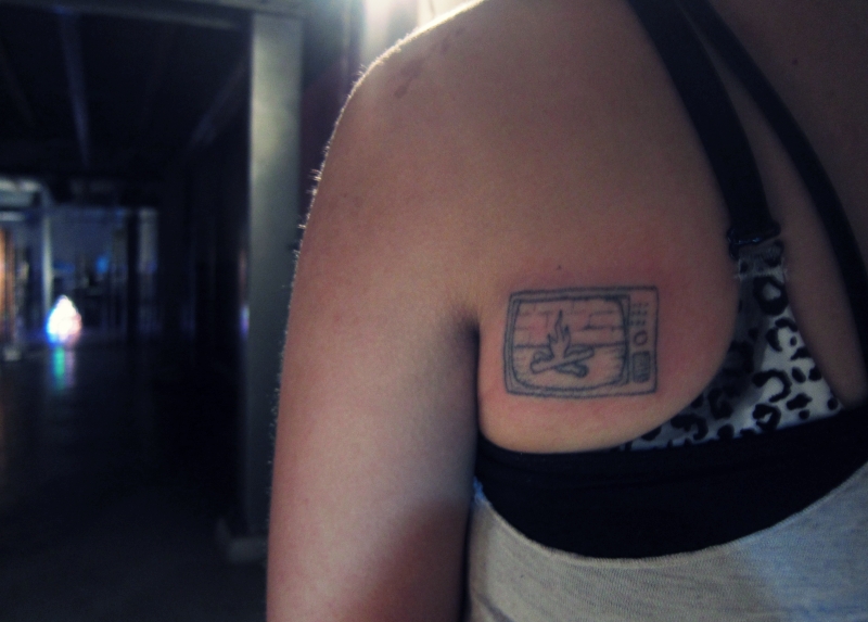 Small Grey Television Tattoo For Girls By Eryon Franklin