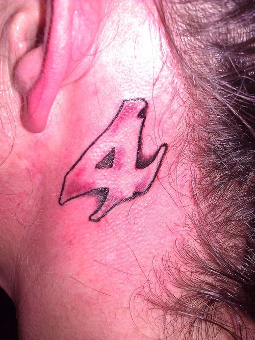 Small Number Four Tattoo On Behind Ear